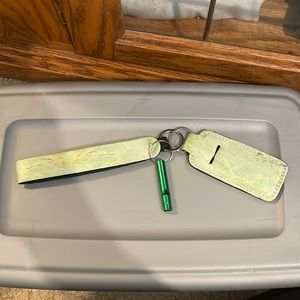 Chapstick holder with safety whistle